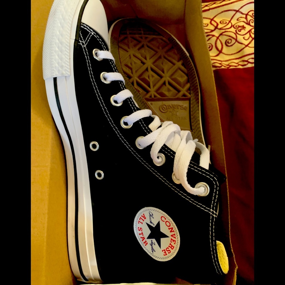 Black Converse “Chucks” HighTop Sneakers.